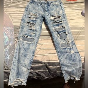 Distressed Light Blue Denim Jeans